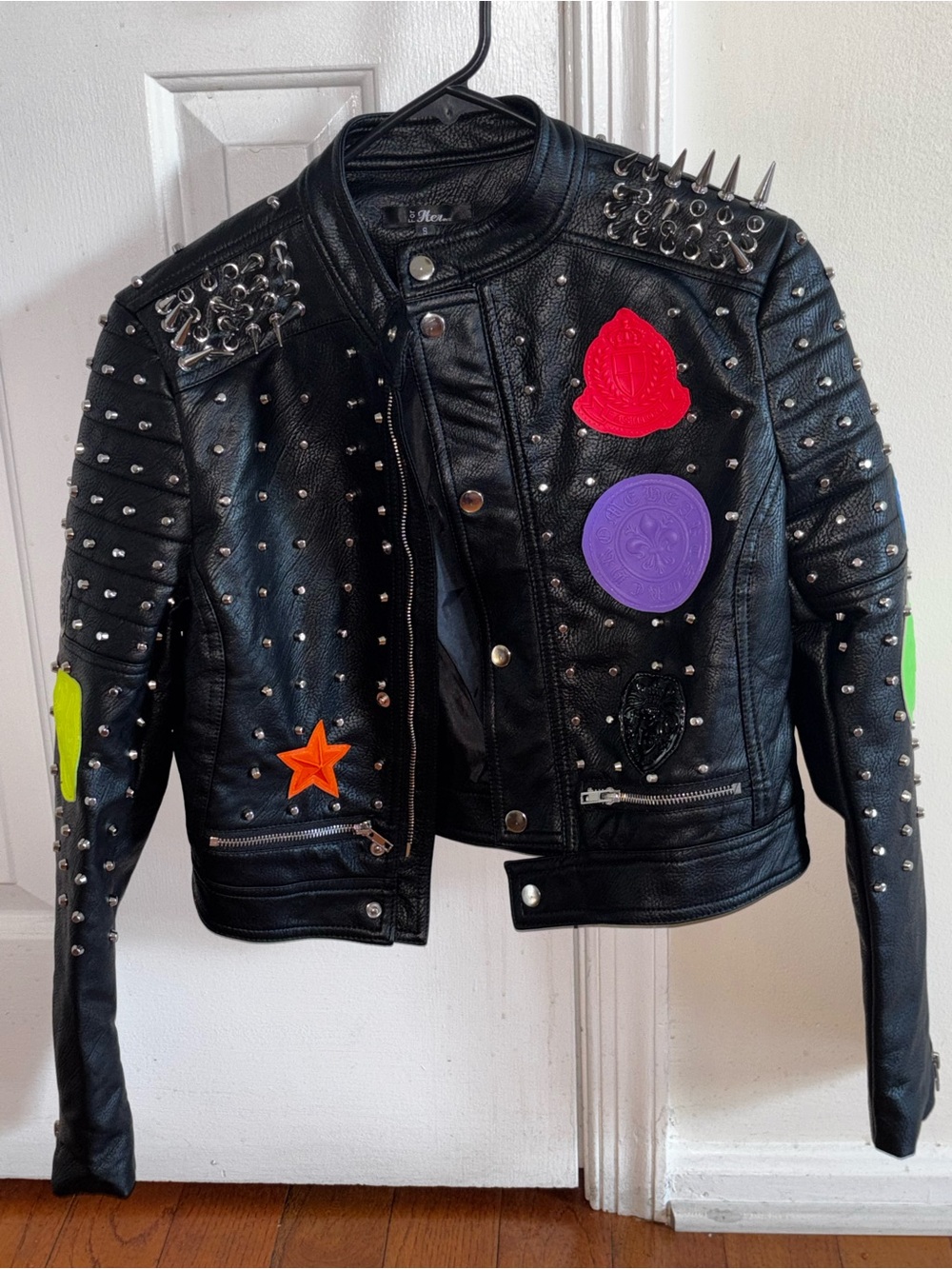 Studded Black Faux Leather Motorcycle Jacket with Colorful Patches